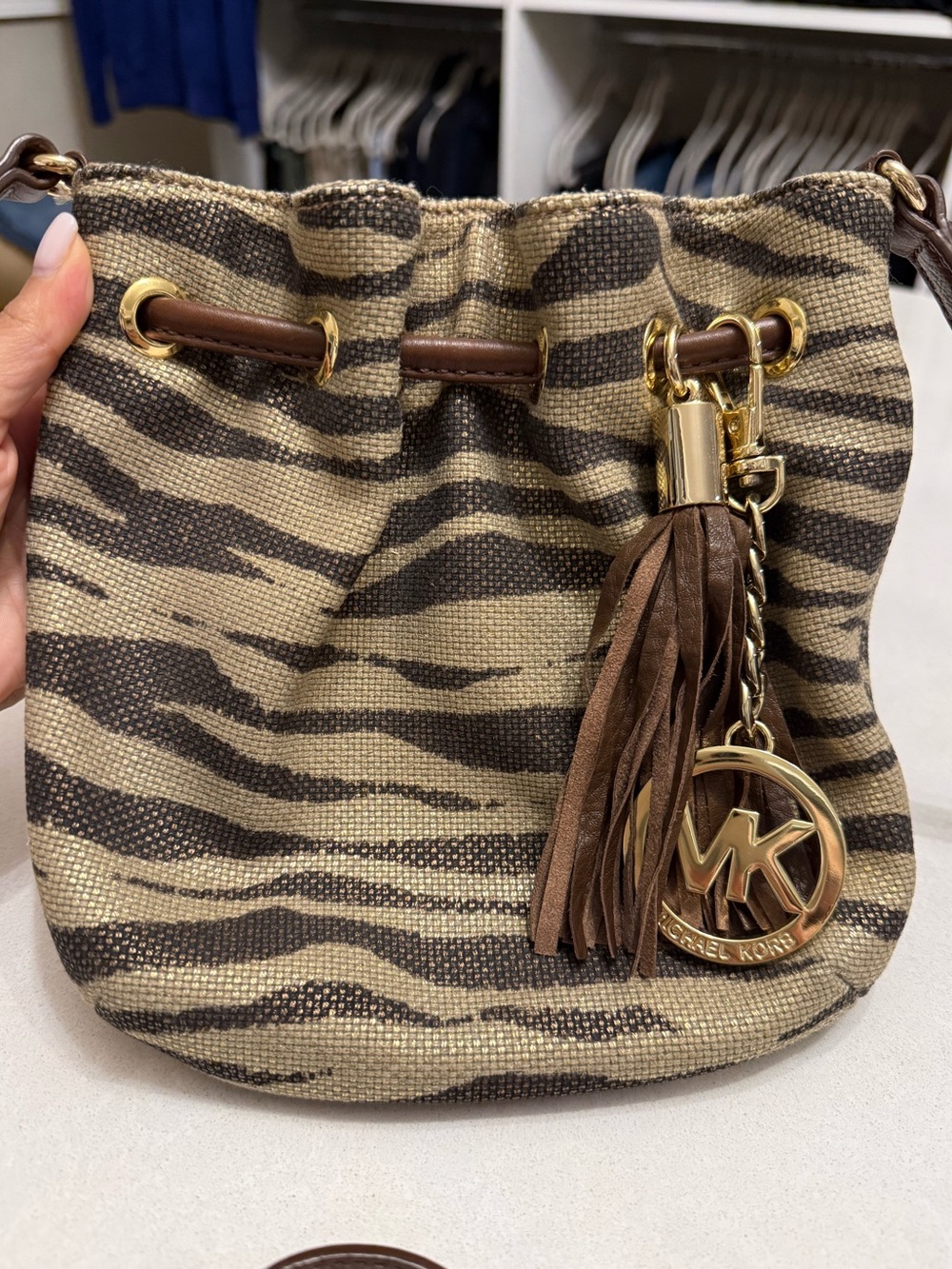 Michael Kors Beige and Brown Zebra-Print Drawstring crossbody Bag with Tassel